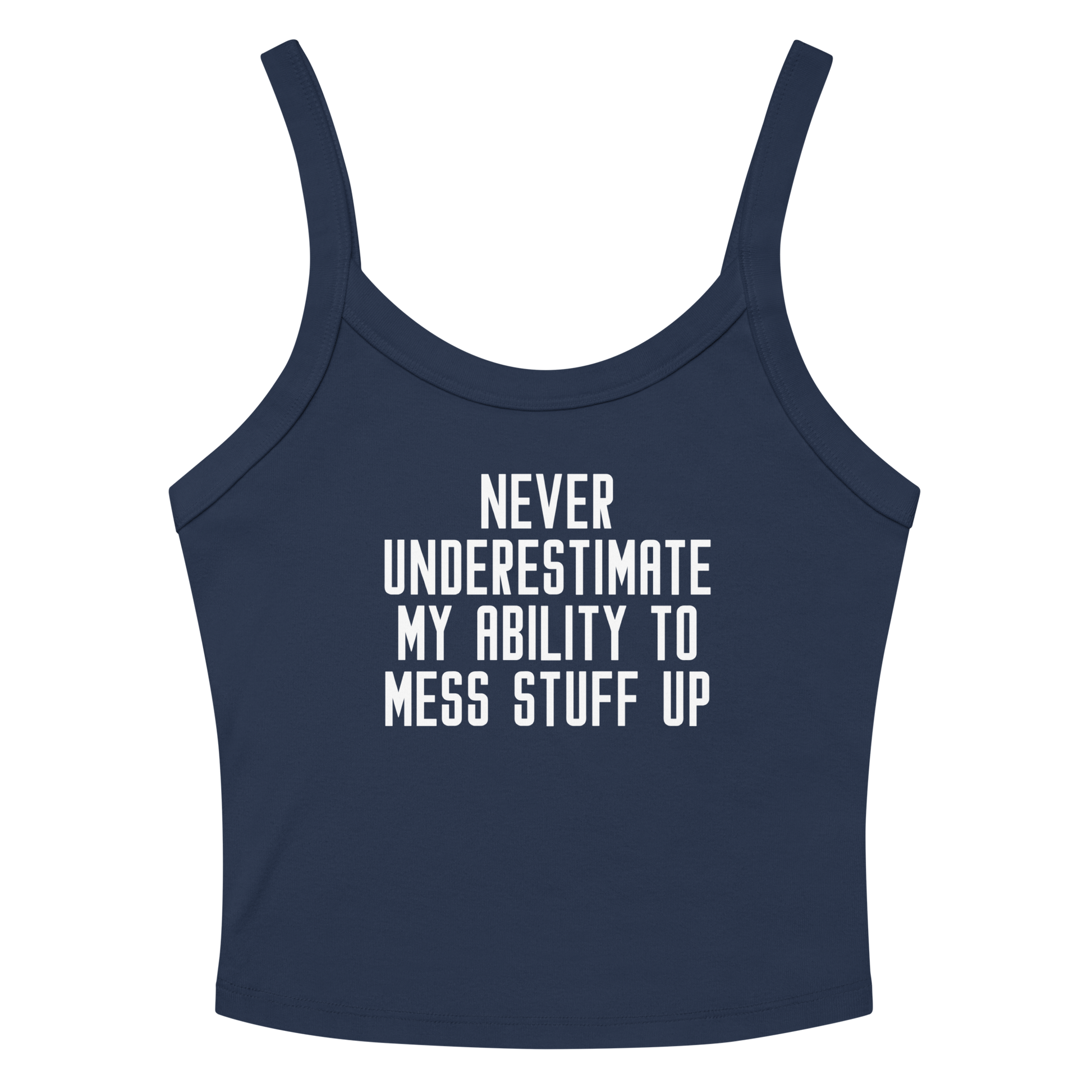 "Never Understimate My Ability To Mess Stuff Up" printed on a solid navy blend women's micro-rib tanktop laying on a flat surface amongst sunglasses and shorts