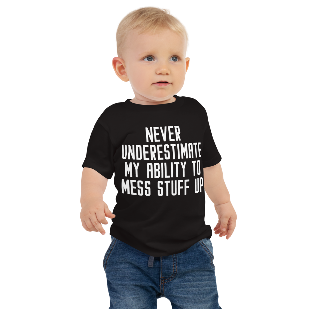 "Never Understimate My Ability To Mess Stuff Up" printed on a black baby jersey short sleeve tee worn by a male