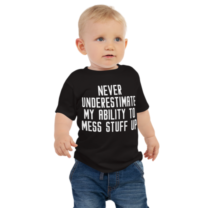 "Never Understimate My Ability To Mess Stuff Up" printed on a black baby jersey short sleeve tee worn by a male