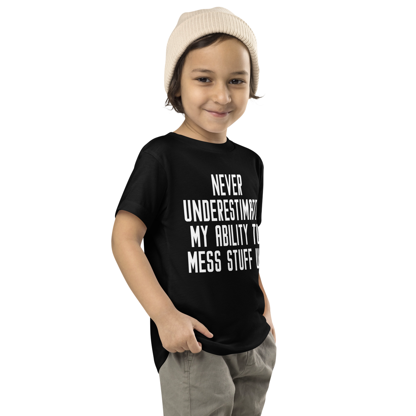 "Never Understimate My Ability To Mess Stuff Up" printed on a black toddler short sleeve tee worn by a male who is also wearing a knit cap