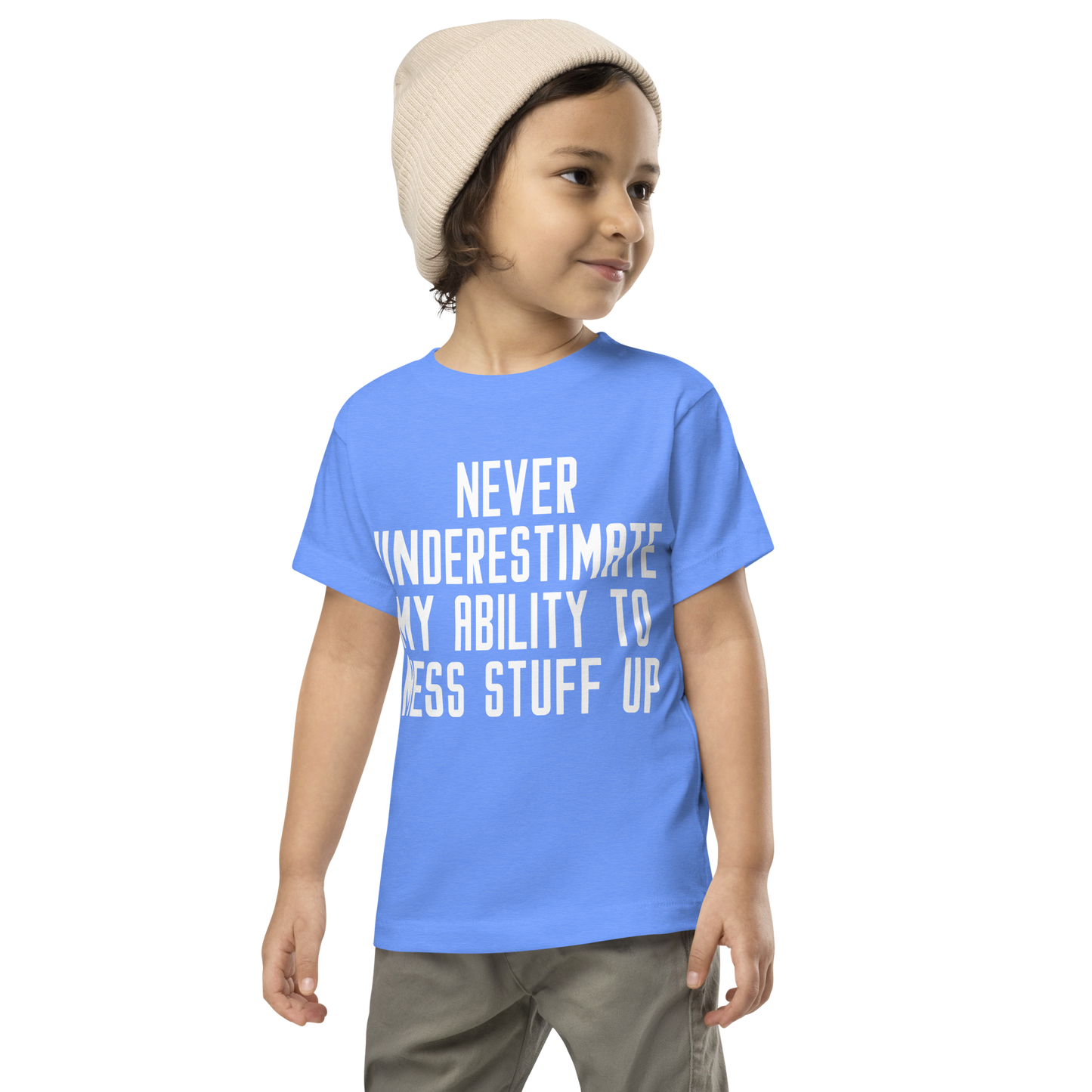 "Never Understimate My Ability To Mess Stuff Up" printed on a heather columbia blue toddler short sleeve tee worn by a male wearing a cap