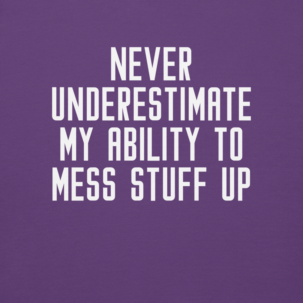 "Never Understimate My Ability To Mess Stuff Up" printed on a purple background