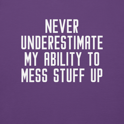 "Never Understimate My Ability To Mess Stuff Up" printed on a purple background