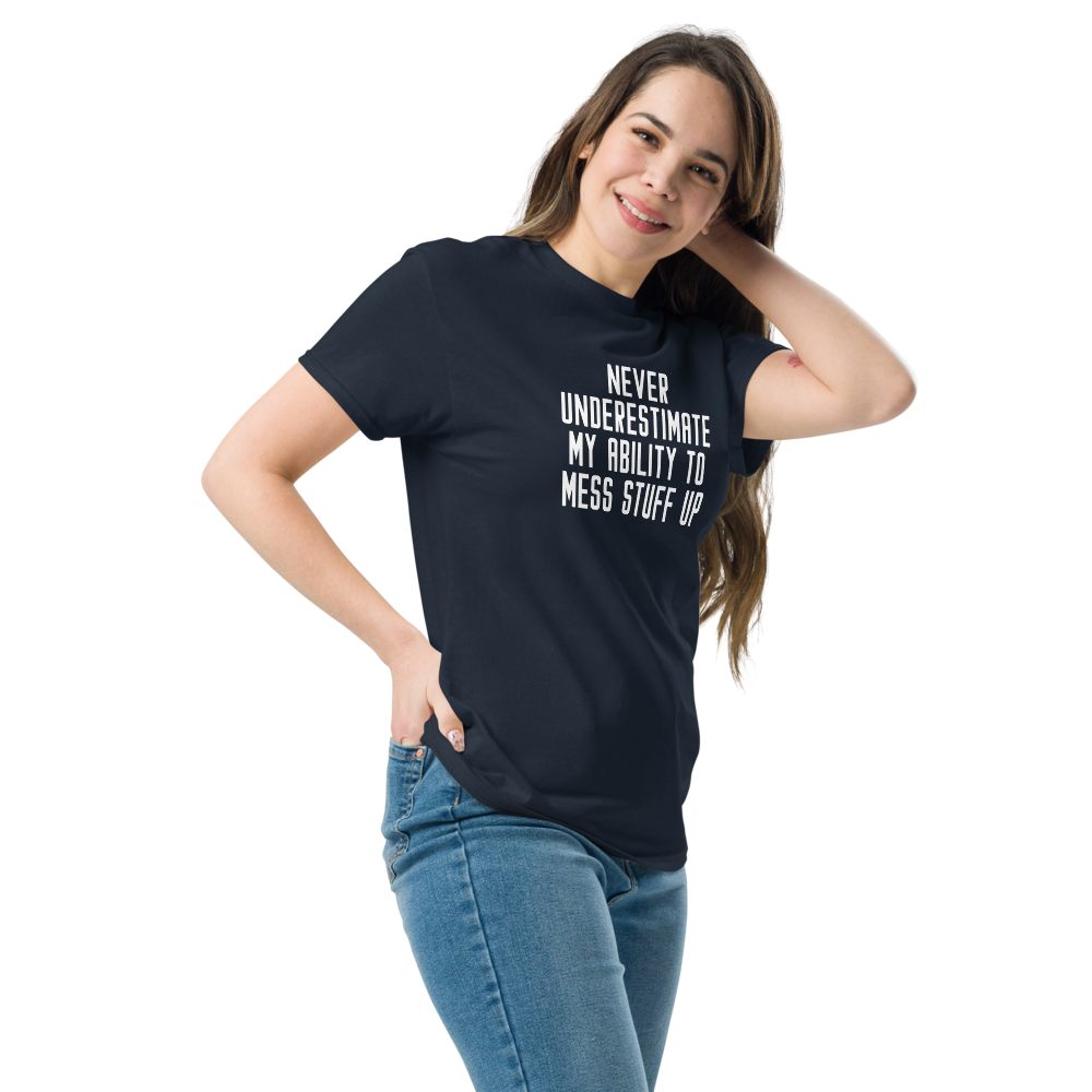 "Never Understimate My Ability To Mess Stuff Up" printed on a navy unisex classic tee worn by a female