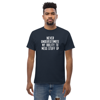 "Never Understimate My Ability To Mess Stuff Up" printed on a navy unisex classic tee worn by a male
