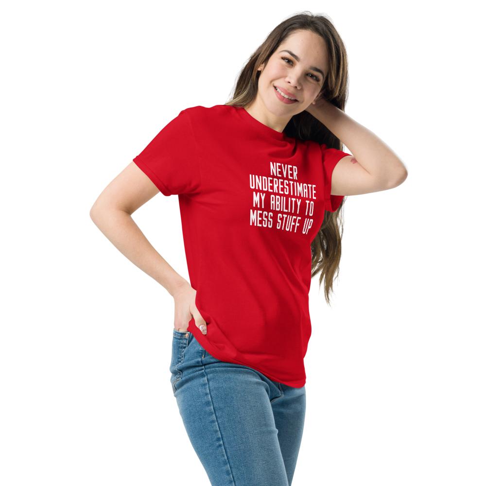 "Never Understimate My Ability To Mess Stuff Up" printed on a red unisex classic tee worn by a female
