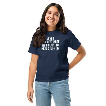 "Never Understimate My Ability To Mess Stuff Up" printed on a navy youth classic tee worn by a female