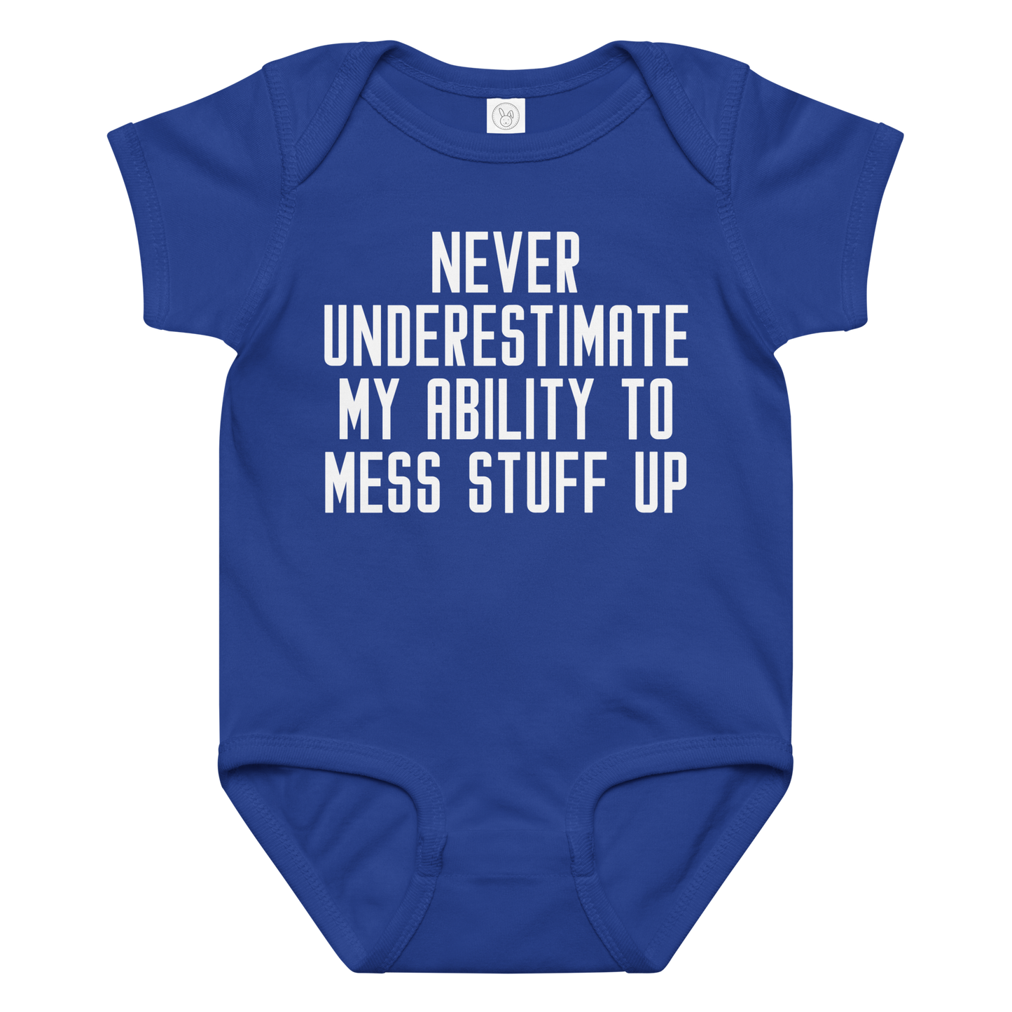 "Never Understimate My Ability To Mess Stuff Up" printed on a royal baby jersey bodysuit laying on a flat surface amongst other clothes
