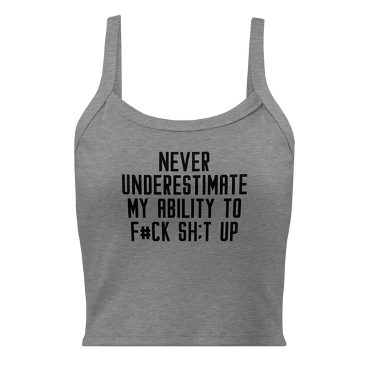 "Never Understimate My Ability To F#Ck Sh:t Up" printed on a athletic heather women's micro-rib tanktop laying on a flat surface