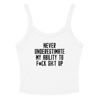 "Never Understimate My Ability To F#Ck Sh:t Up" printed on a solid white blend women's micro-rib tanktop laying on a flat surface amongst sunglasses and shorts