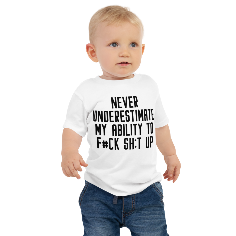 "Never Understimate My Ability To F#Ck Sh:t Up" printed on a white baby jersey short sleeve tee worn by a male