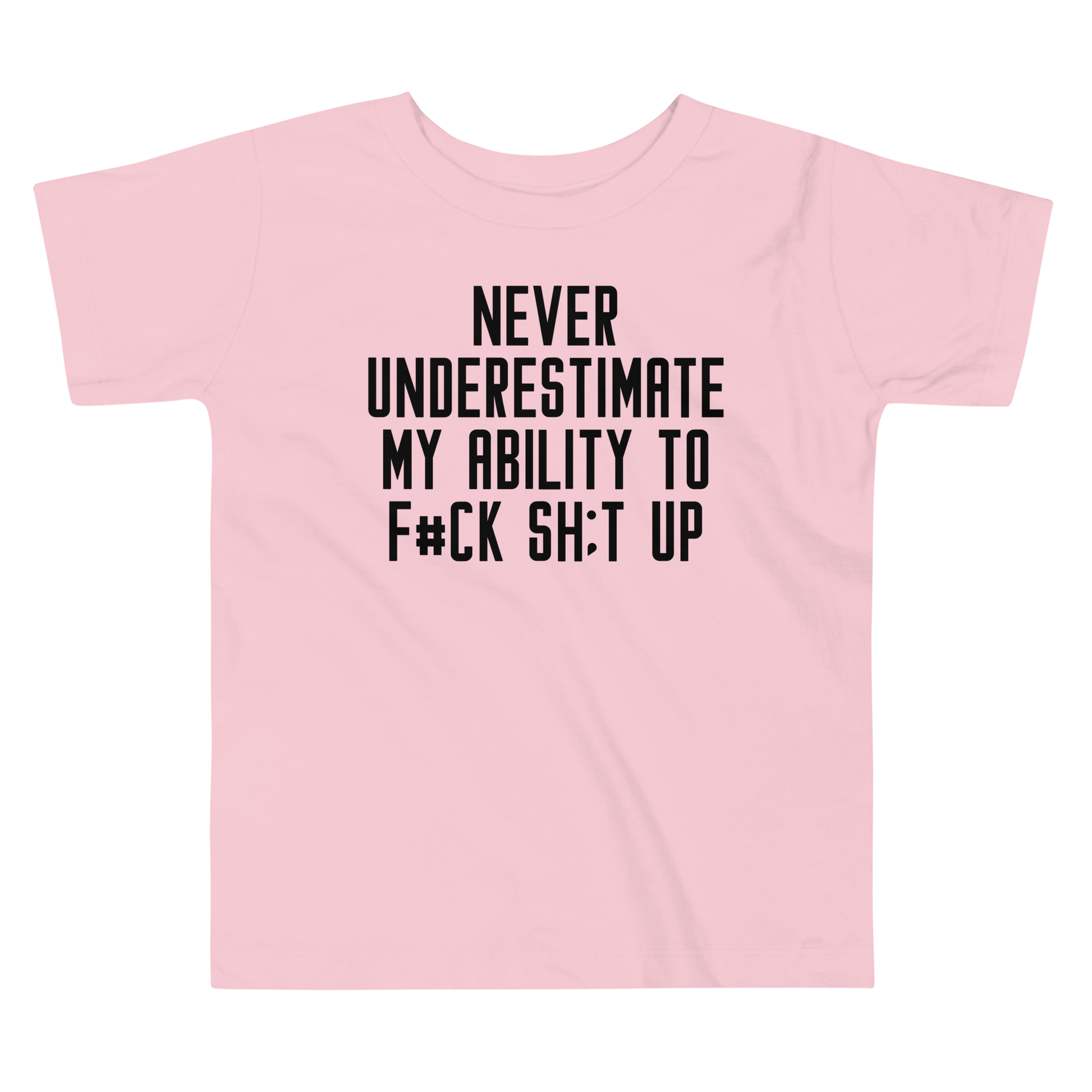 "Never Understimate My Ability To F#Ck Sh:t Up" printed on a pink toddler short sleeve tee laying on a flat surface
