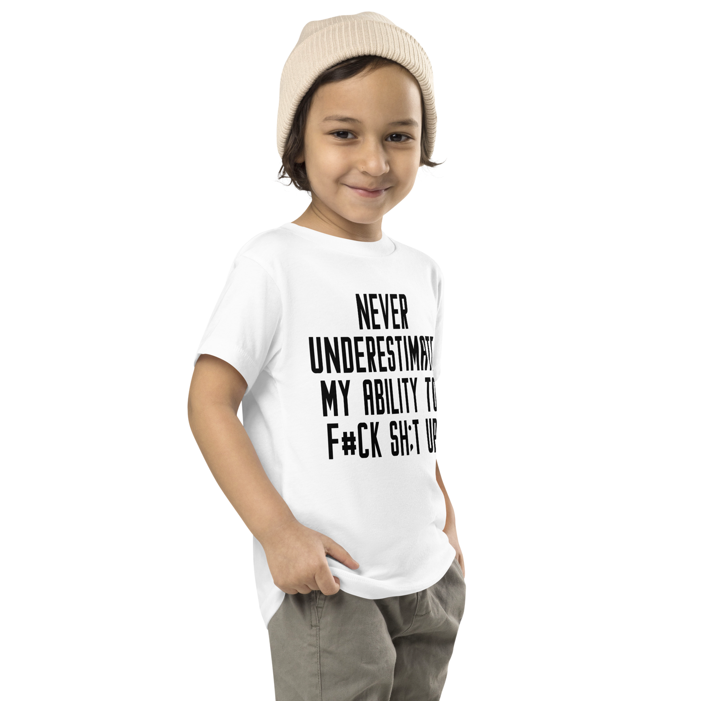 "Never Understimate My Ability To F#Ck Sh:t Up" printed on a white toddler short sleeve tee worn by a male who is also wearing a knit cap