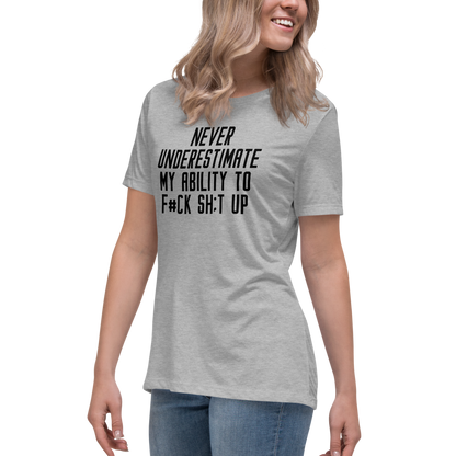 "Never Understimate My Ability To F#Ck Sh:t Up" printed on a athletic heather women's relaxed t-shirt worn by a female