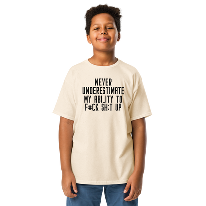 "Never Understimate My Ability To F#Ck Sh:t Up" printed on a natural youth classic tee worn by a male