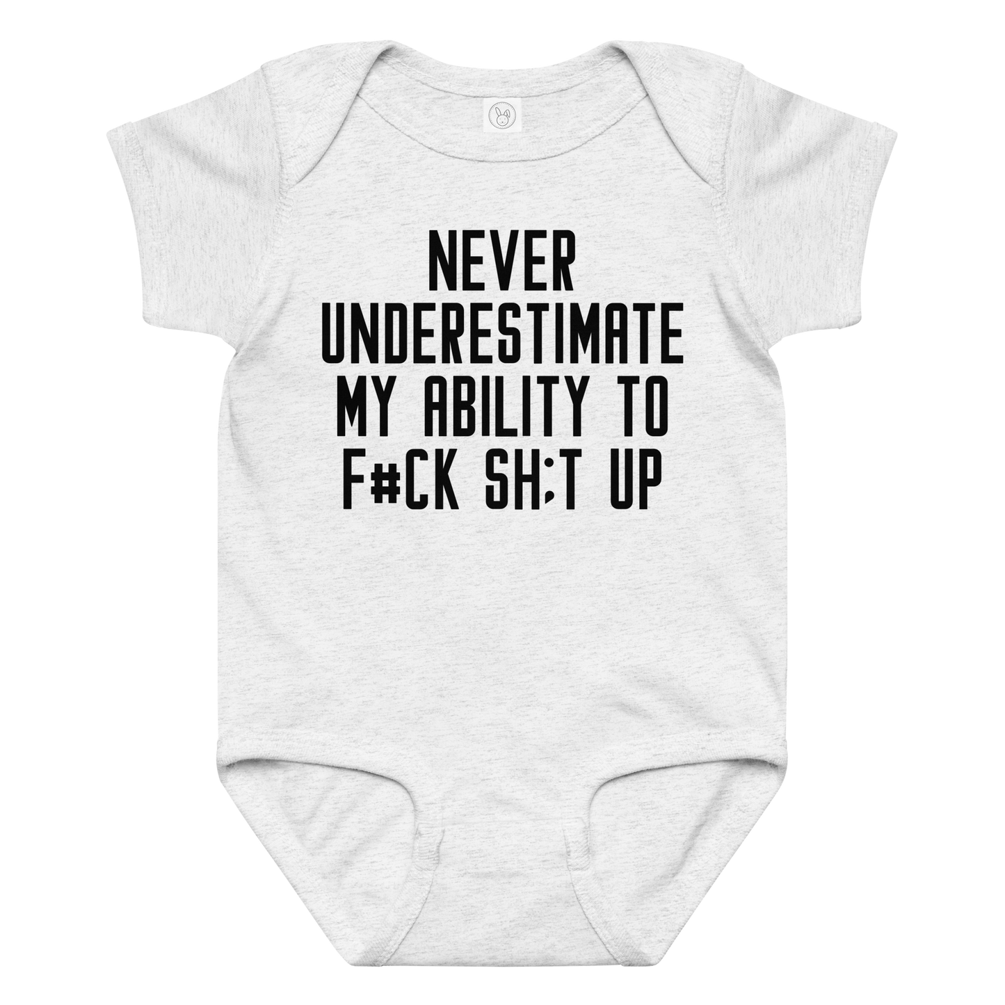 "Never Understimate My Ability To F#Ck Sh:t Up" printed on a ash baby jersey bodysuit laying on a flat surface amongst other clothes