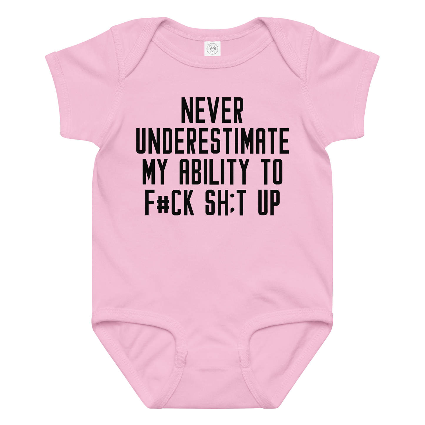 "Never Understimate My Ability To F#Ck Sh:t Up" printed on a pink baby jersey bodysuit laying on a flat surface amongst other clothes