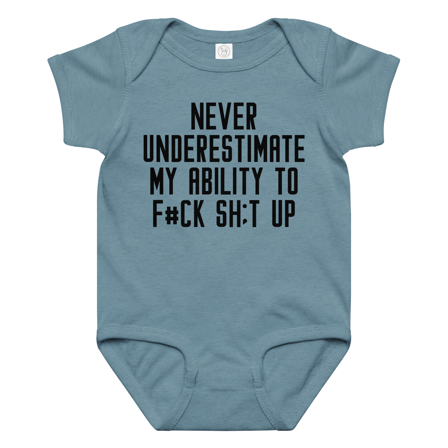 "Never Understimate My Ability To F#Ck Sh:t Up" printed on a vintage indigo baby jersey bodysuit laying on a flat surface amongst other clothes