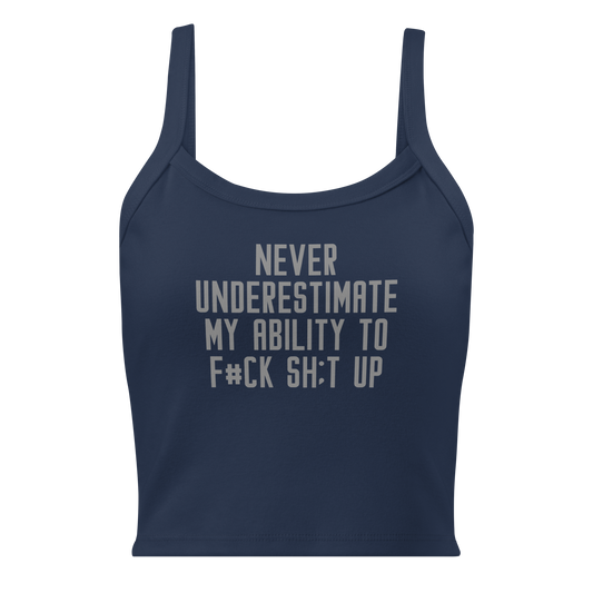 "Never Understimate My Ability To F#Ck Sh:t Up" printed on a solid navy blend women's micro-rib tanktop laying on a flat surface