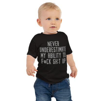"Never Understimate My Ability To F#Ck Sh:t Up" printed on a black baby jersey short sleeve tee worn by a male