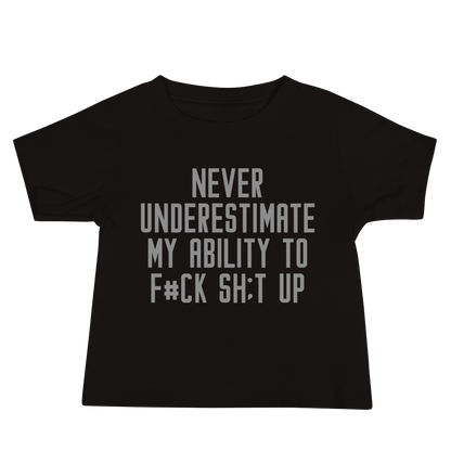 "Never Understimate My Ability To F#Ck Sh:t Up" printed on a black baby jersey short sleeve tee laying on a flat surface