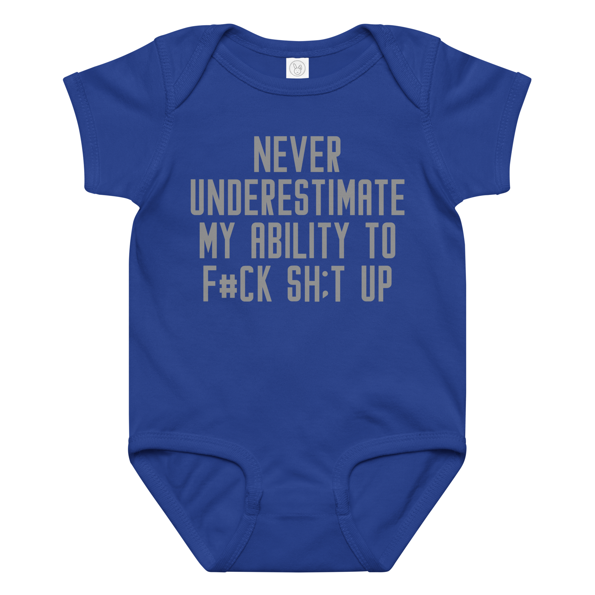 "Never Understimate My Ability To F#Ck Sh:t Up" printed on a royal baby jersey bodysuit laying on a flat surface amongst other clothes