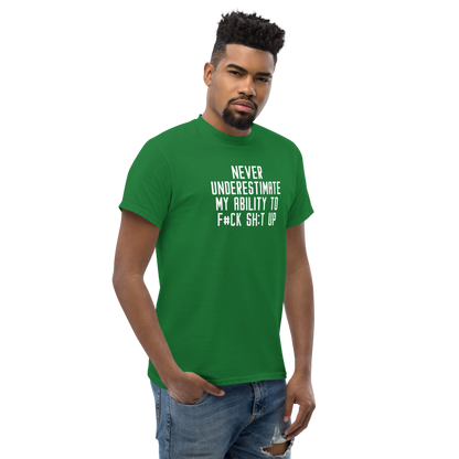 "Never Understimate My Ability To F#Ck Sh:t Up" printed on a turf green unisex classic tee worn by a male