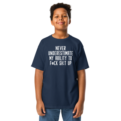 "Never Understimate My Ability To F#Ck Sh:t Up" printed on a navy youth classic tee worn by a male