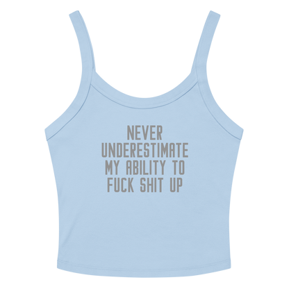 "Never Understimate My Ability To Fuck Shit Up" printed on a solid baby blue blend women's micro-rib tanktop laying on a flat surface amongst sunglasses and shorts