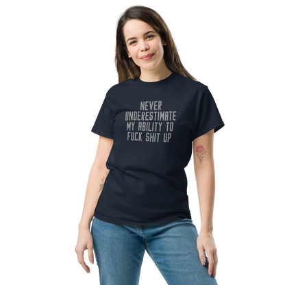 "Never Understimate My Ability To Fuck Shit Up" printed on a navy unisex classic tee worn by a female