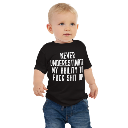 "Never Understimate My Ability To Fuck Shit Up" printed on a black baby jersey short sleeve tee worn by a male