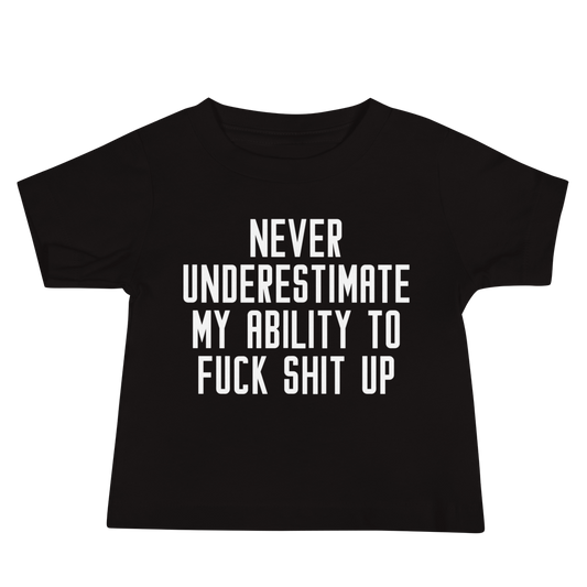 "Never Understimate My Ability To Fuck Shit Up" printed on a black baby jersey short sleeve tee laying on a flat surface