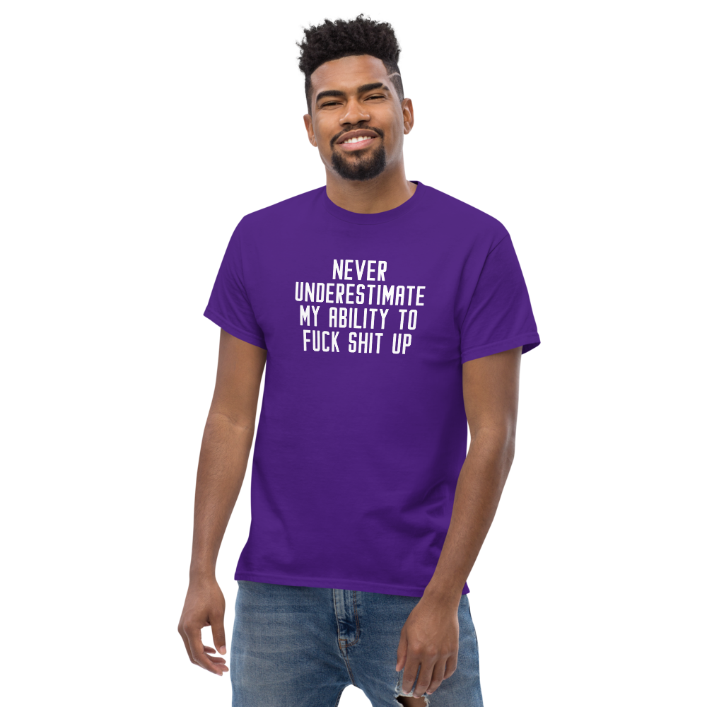 "Never Understimate My Ability To Fuck Shit Up" printed on a purple unisex classic tee worn by a male