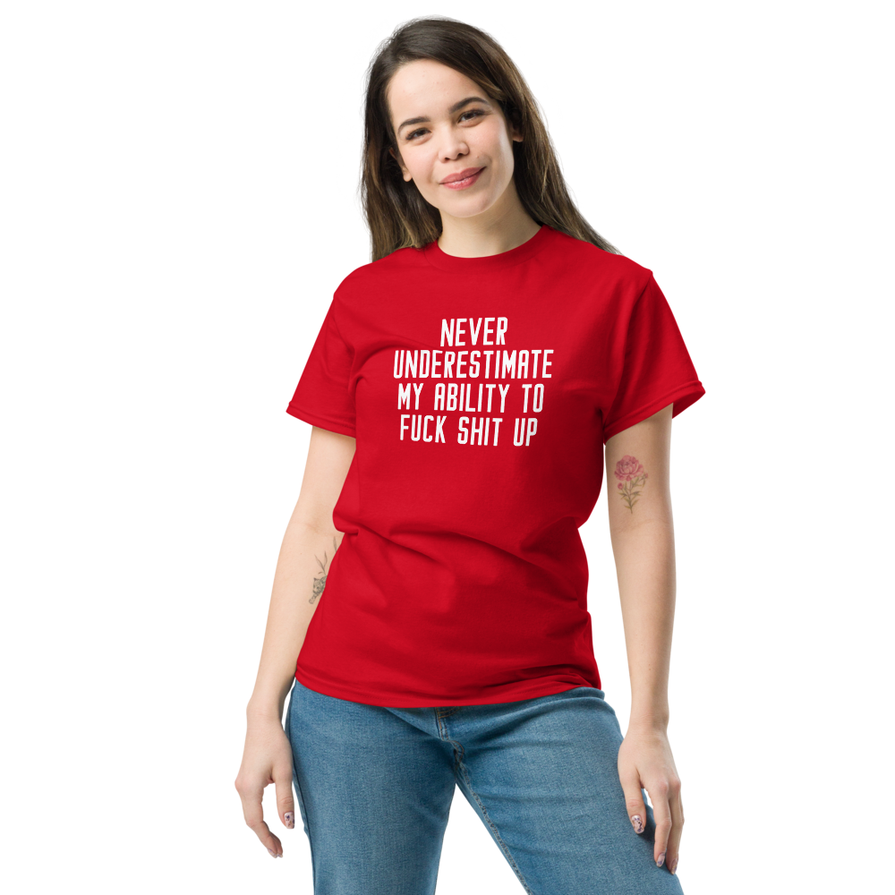 "Never Understimate My Ability To Fuck Shit Up" printed on a red unisex classic tee worn by a female
