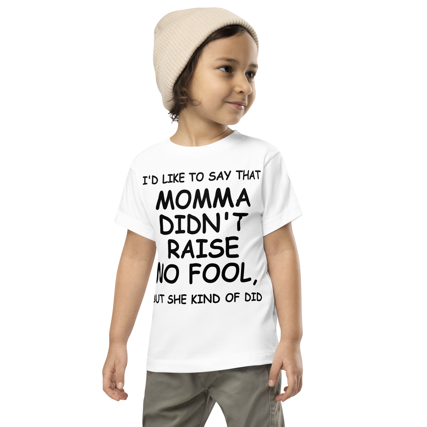 "I'd like to say that momma didn't raise no fool, but she kind of did" printed on a white toddler short sleeve tee worn by a male wearing a cap