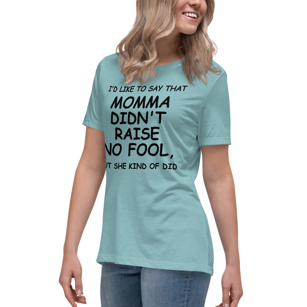 "I'd like to say that momma didn't raise no fool, but she kind of did" printed on a heather blue lagoon women's relaxed t-shirt worn by a female