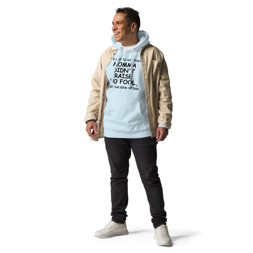 "I'd like to say that momma didn't raise no fool, but she kind of did" printed on a sky blue unisex hoodie worn by a male with a jacket on top