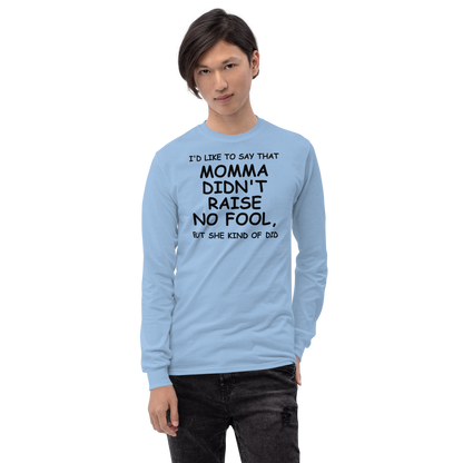 "I'd like to say that momma didn't raise no fool, but she kind of did" printed on a light blue men's long sleeve shirt worn by a male