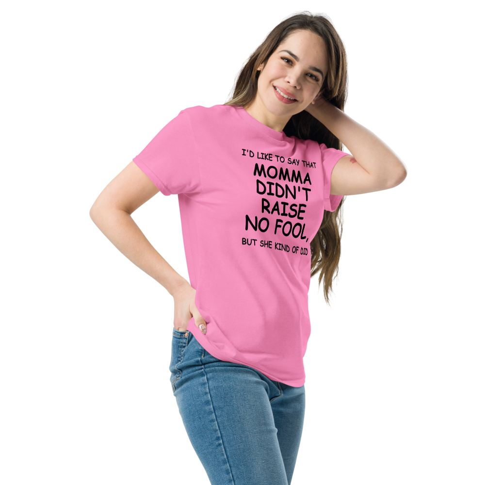 "I'd like to say that momma didn't raise no fool, but she kind of did" printed on a azalea unisex classic tee worn by a female