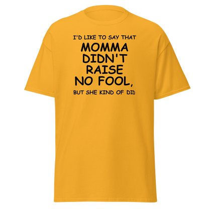 "I'd like to say that momma didn't raise no fool, but she kind of did" printed on a gold on an invisible body
