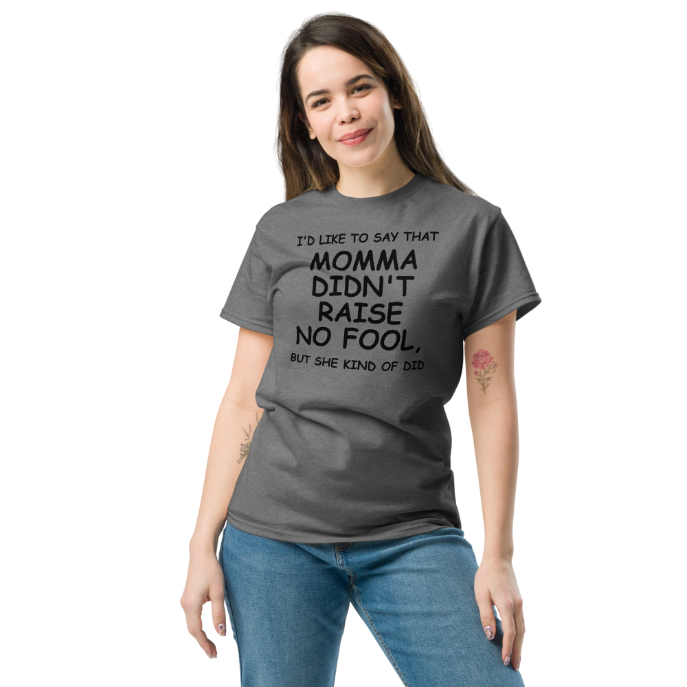 "I'd like to say that momma didn't raise no fool, but she kind of did" printed on a graphite heather unisex classic tee worn by a female