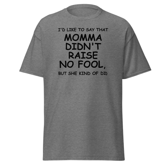 "I'd like to say that momma didn't raise no fool, but she kind of did" printed on a graphite heather unisex classic tee laying on a flat surface