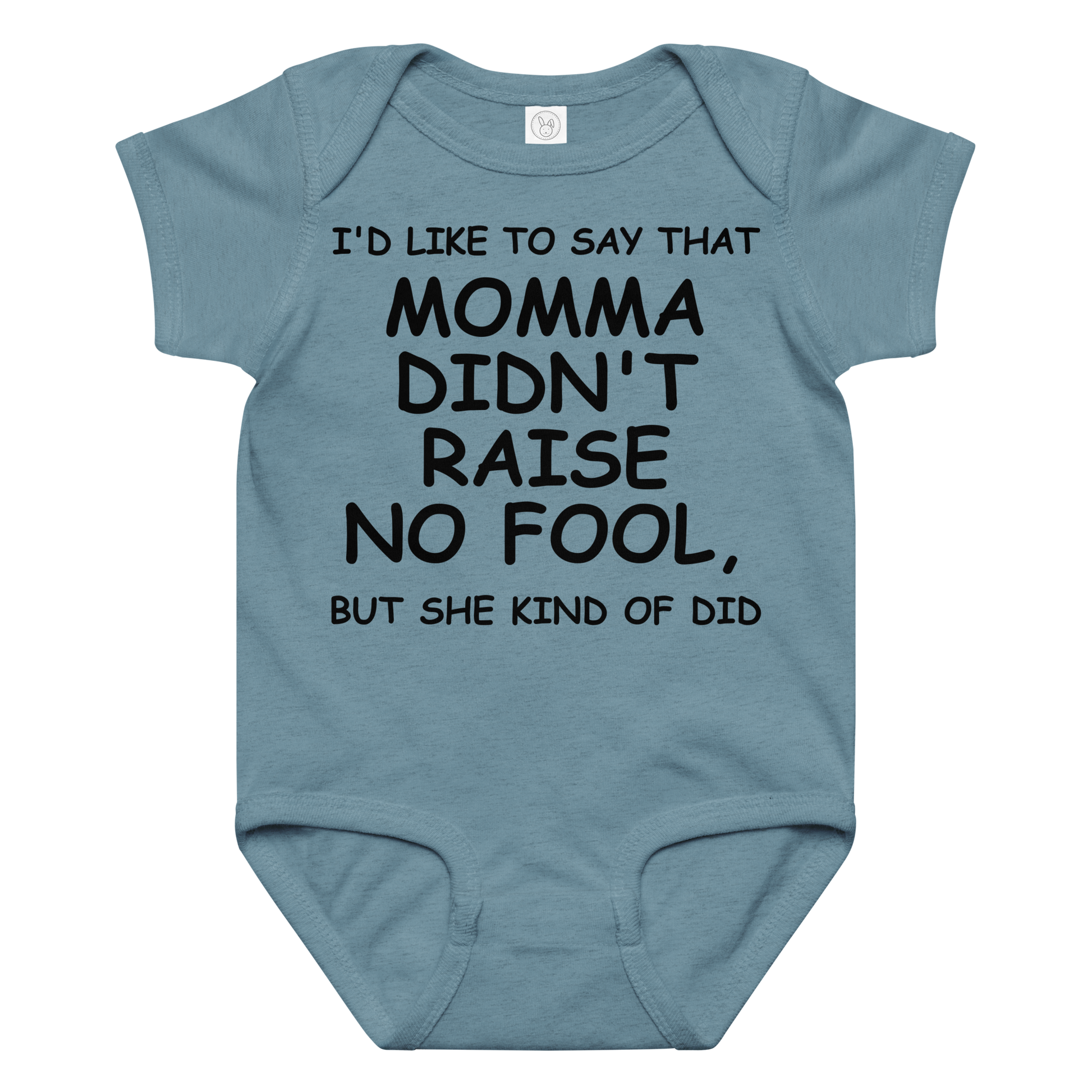 "I'd like to say that momma didn't raise no fool, but she kind of did" printed on a vintage indigo baby jersey bodysuit laying on a flat surface amongst other clothes