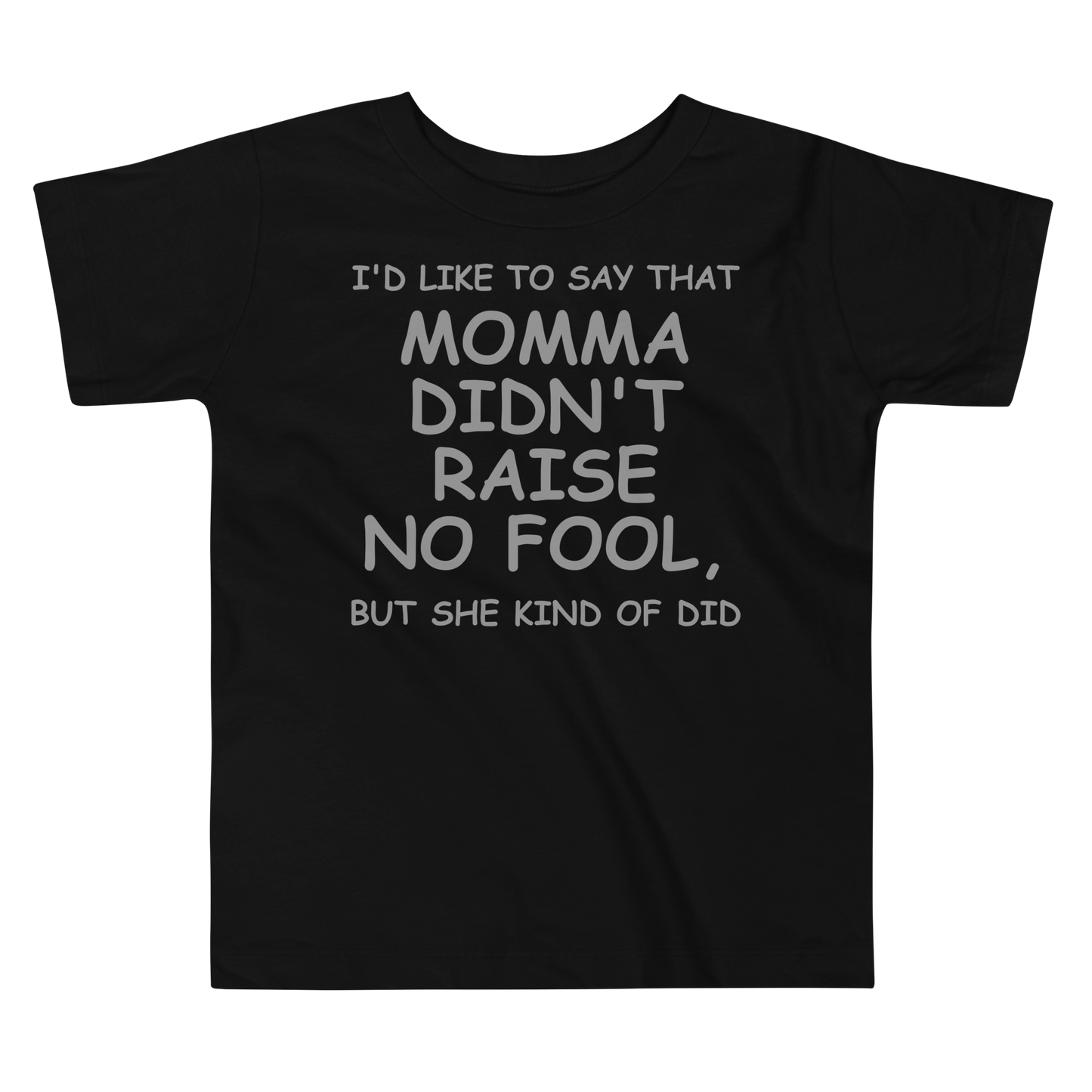 "I'd like to say that momma didn't raise no fool, but she kind of did" printed on a black toddler short sleeve tee laying on a flat surface