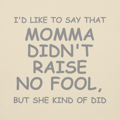 "I'd like to say that momma didn't raise no fool, but she kind of did" printed on a bone background