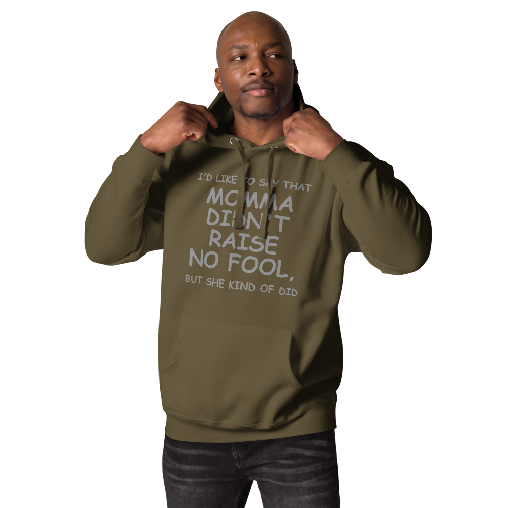 "I'd like to say that momma didn't raise no fool, but she kind of did" printed on a military green unisex hoodie worn by a male