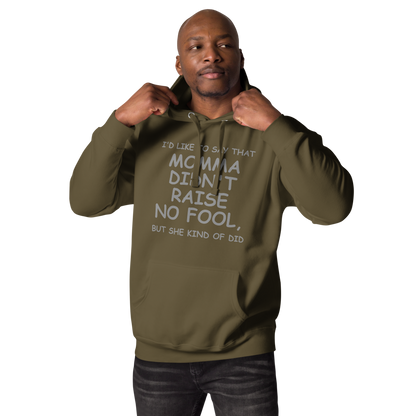 "I'd like to say that momma didn't raise no fool, but she kind of did" printed on a military green unisex hoodie worn by a male