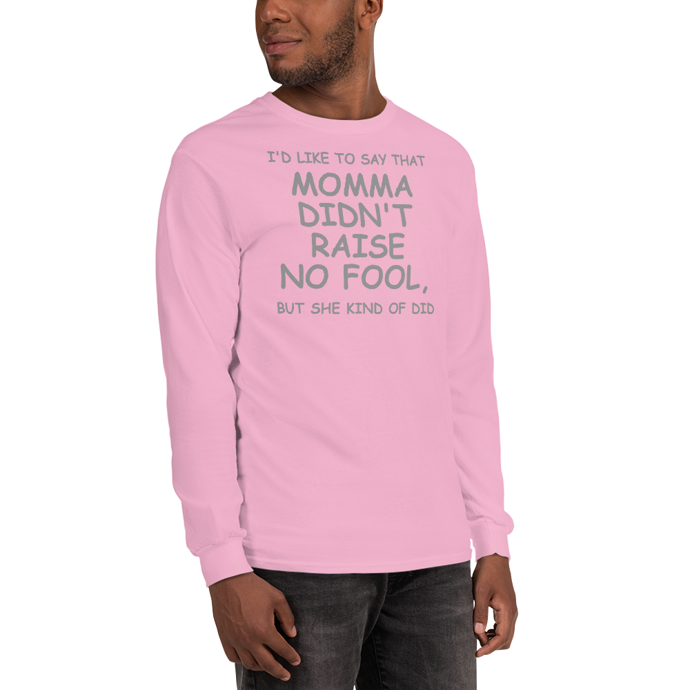 "I'd like to say that momma didn't raise no fool, but she kind of did" printed on a light pink men's long sleeve shirt worn by a male