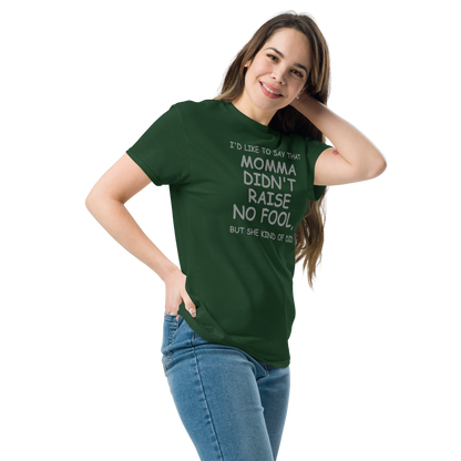 "I'd like to say that momma didn't raise no fool, but she kind of did" printed on a forest green unisex classic tee worn by a female