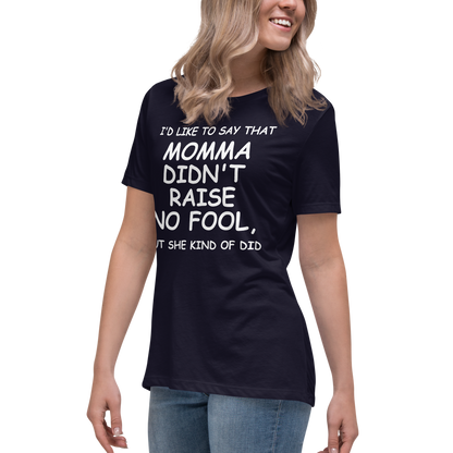 "I'd like to say that momma didn't raise no fool, but she kind of did" printed on a navy women's relaxed t-shirt worn by a female